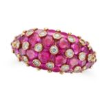 A RUBY AND DIAMOND BOMBE RING in 18ct yellow gold, the bombe face set with round cut rubies accen...