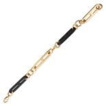 GUCCI, AN EBONY BRACELET comprising a row of alternating ebony and gold fancy links, signed Gucci...