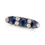 AN ANTIQUE SAPPHIRE AND DIAMOND RING in yellow gold, set with three cushion cut sapphires  accent...