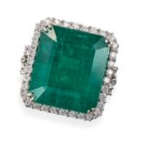 AN EMERALD AND DIAMOND RING set with an octagonal step cut emerald of 23.45 carats in a border of...