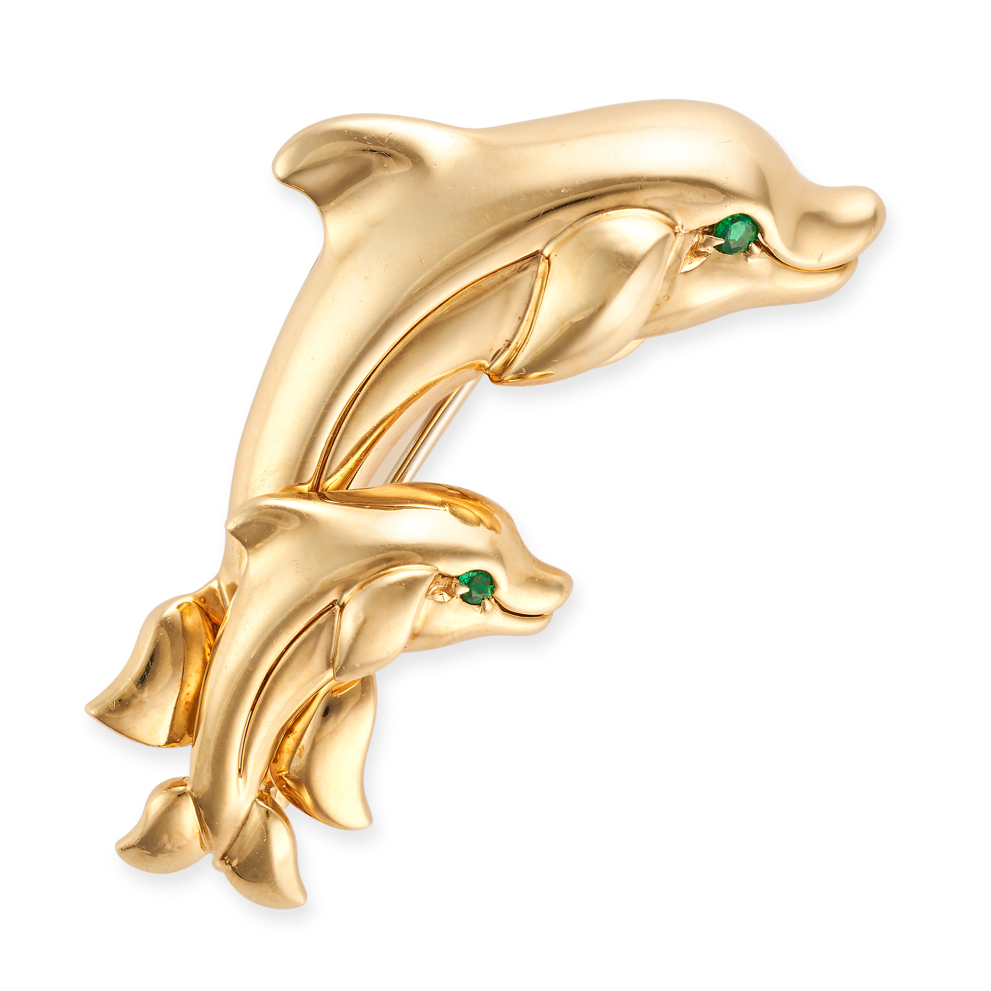 CARTIER, AN EMERALD DOLPHIN BROOCH in 18ct yellow gold, designed as a mother and baby dolphin swi...