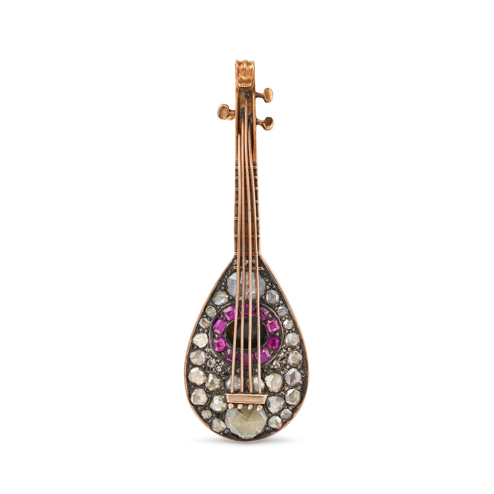 AN ANTIQUE DIAMOND AND RUBY MANDOLIN BROOCH in yellow gold and silver, designed as a mandolin set...
