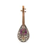 AN ANTIQUE DIAMOND AND RUBY MANDOLIN BROOCH in yellow gold and silver, designed as a mandolin set...