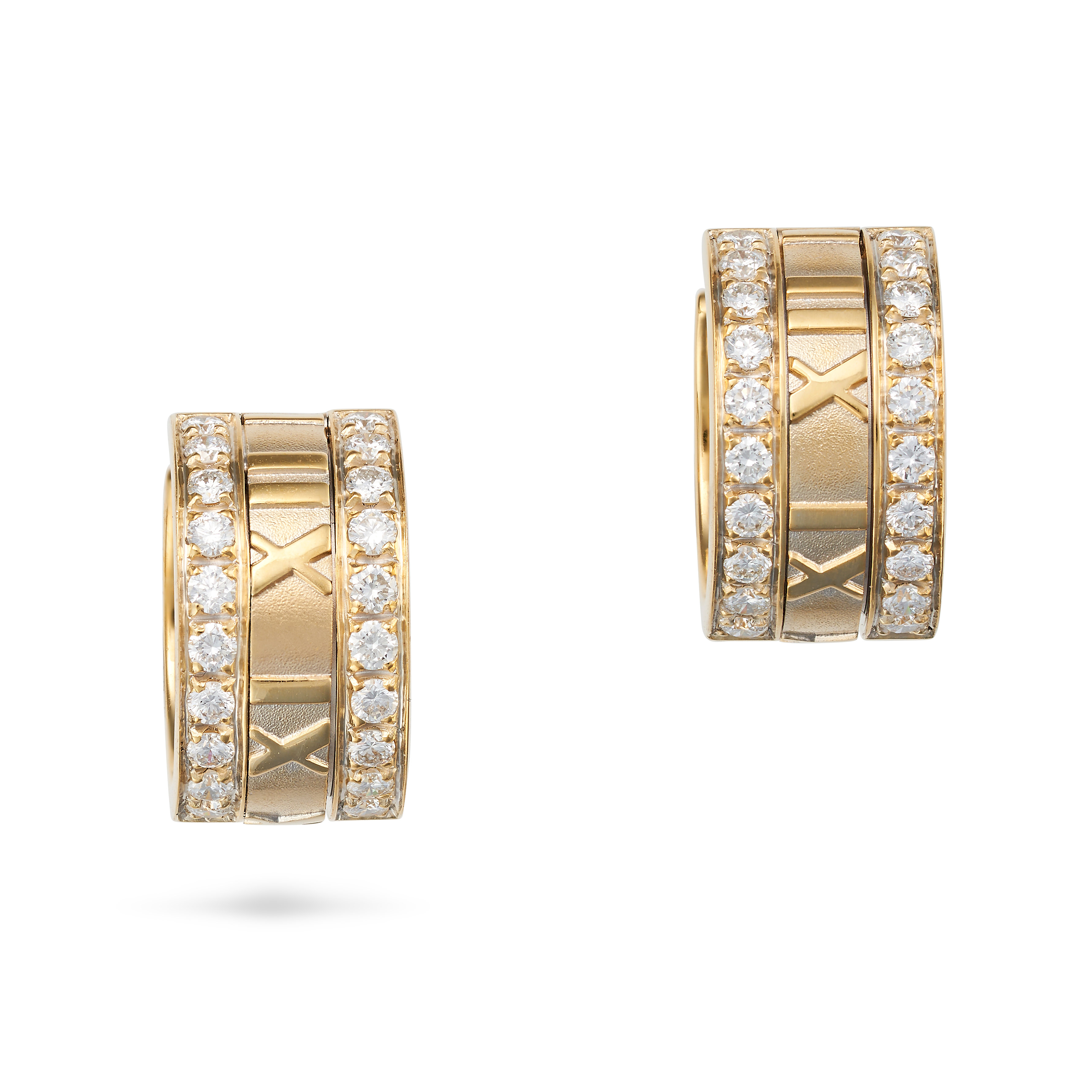 TIFFANY & CO., A PAIR OF DIAMOND ATLAS EARRINGS, 1995 each in a hoop design with embossed Roman n...