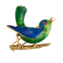 BOUCHERON, AN ENAMEL AND RUBY BIRD BROOCH in 18ct yellow gold, designed as a bird perched on a br...