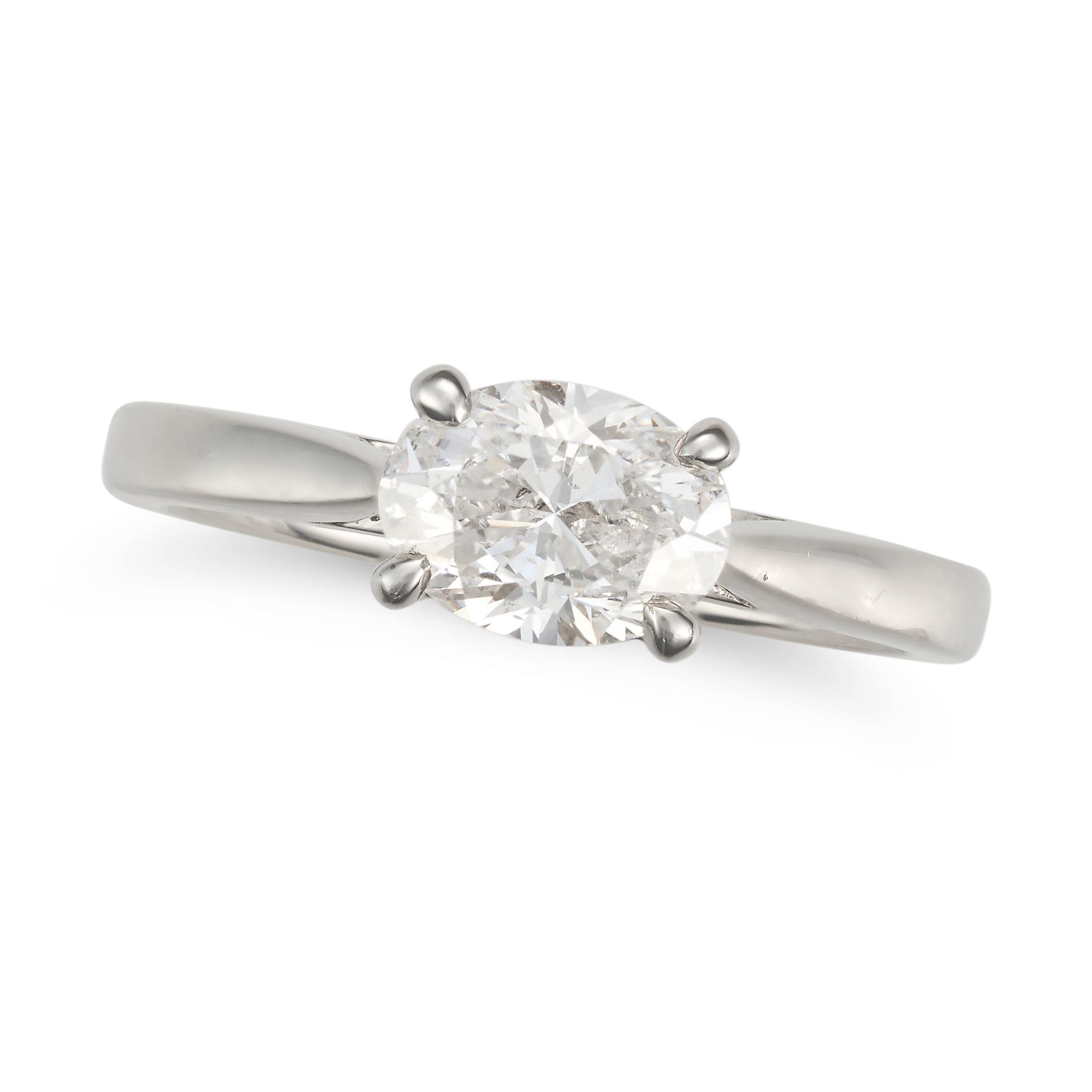 A 1.20 CARAT D COLOUR SOLITAIRE DIAMOND RING in platinum, set east west with an oval brilliant cu...