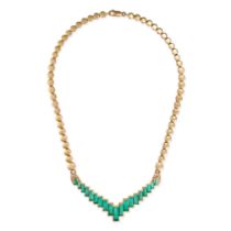 AN EMERALD AND DIAMOND NECKLACE comprising a row of circular links, suspending a geometric pendan...