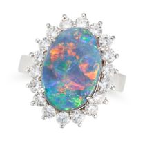 A BLACK OPAL AND DIAMOND CLUSTER RING set with an oval cabochon black opal of approximately 3.92 ...