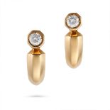 CARTIER, A PAIR OF DIAMOND CLIP EARRINGS in 18ct yellow gold, each set with a round brilliant cut...