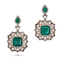 A PAIR OF ZAMBIAN EMERALD AND DIAMOND DROP EARRINGS each set with a pear cut emerald in a border ...