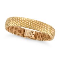 MAUBOUSSIN, A GOLD BRACELET in 18ct yellow gold, with a textured scale design, signed Mauboussin ...