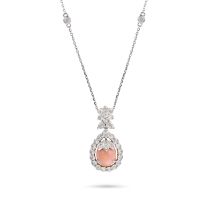 A CONCH PEARL AND DIAMOND PENDANT NECKLACE the pendant set with a conch pearl of approximately 7....