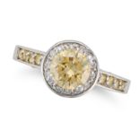A NATURAL FANCY ORANGY YELLOW AND WHITE DIAMOND RING set with a round brilliant cut diamond of 1....