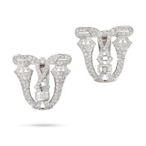 A PAIR OF DIAMOND CLIP BROOCHES each openwork clip in identical design, set throughout with singl...