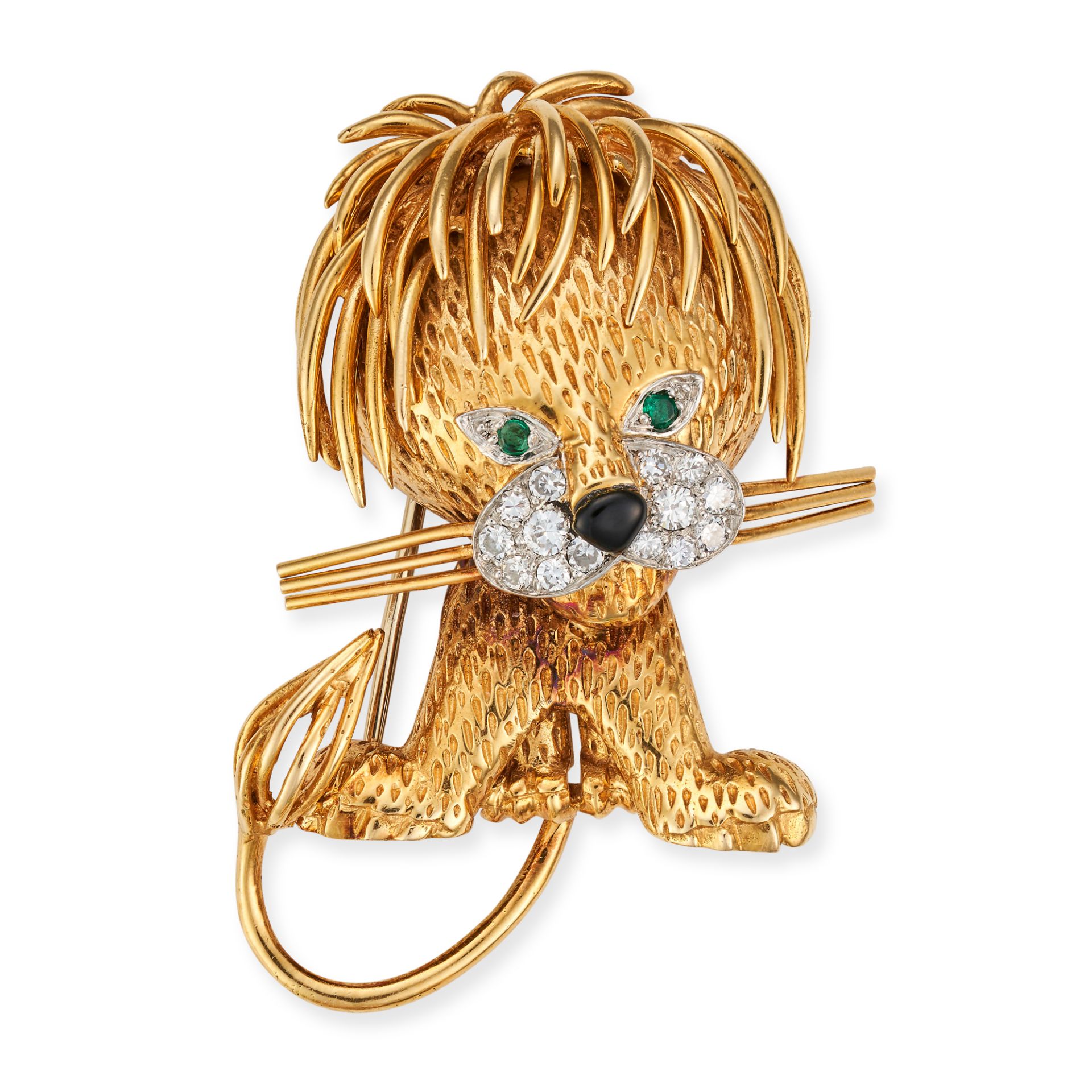 VAN CLEEF & ARPELS, A DIAMOND, EMERALD AND ONYX LION EBOURIFFE BROOCH in yellow gold and platinum...