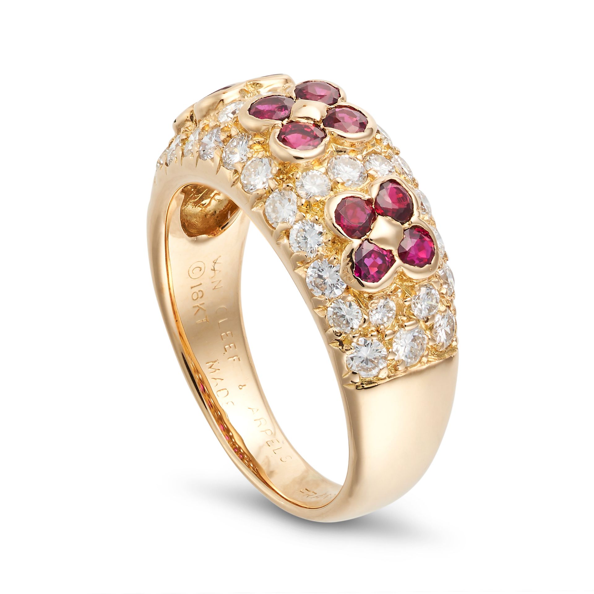 VAN CLEEF & ARPELS, A RUBY AND DIAMOND FLOWER RING in 18ct yellow gold, the bombe face set with r... - Bild 2 aus 2