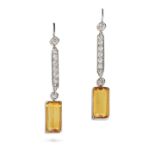 A PAIR OF YELLOW SAPPHIRE AND DIAMOND DROP EARRINGS each comprising a row of round brilliant cut ...