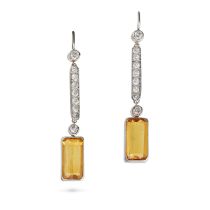 A PAIR OF YELLOW SAPPHIRE AND DIAMOND DROP EARRINGS each comprising a row of round brilliant cut ...