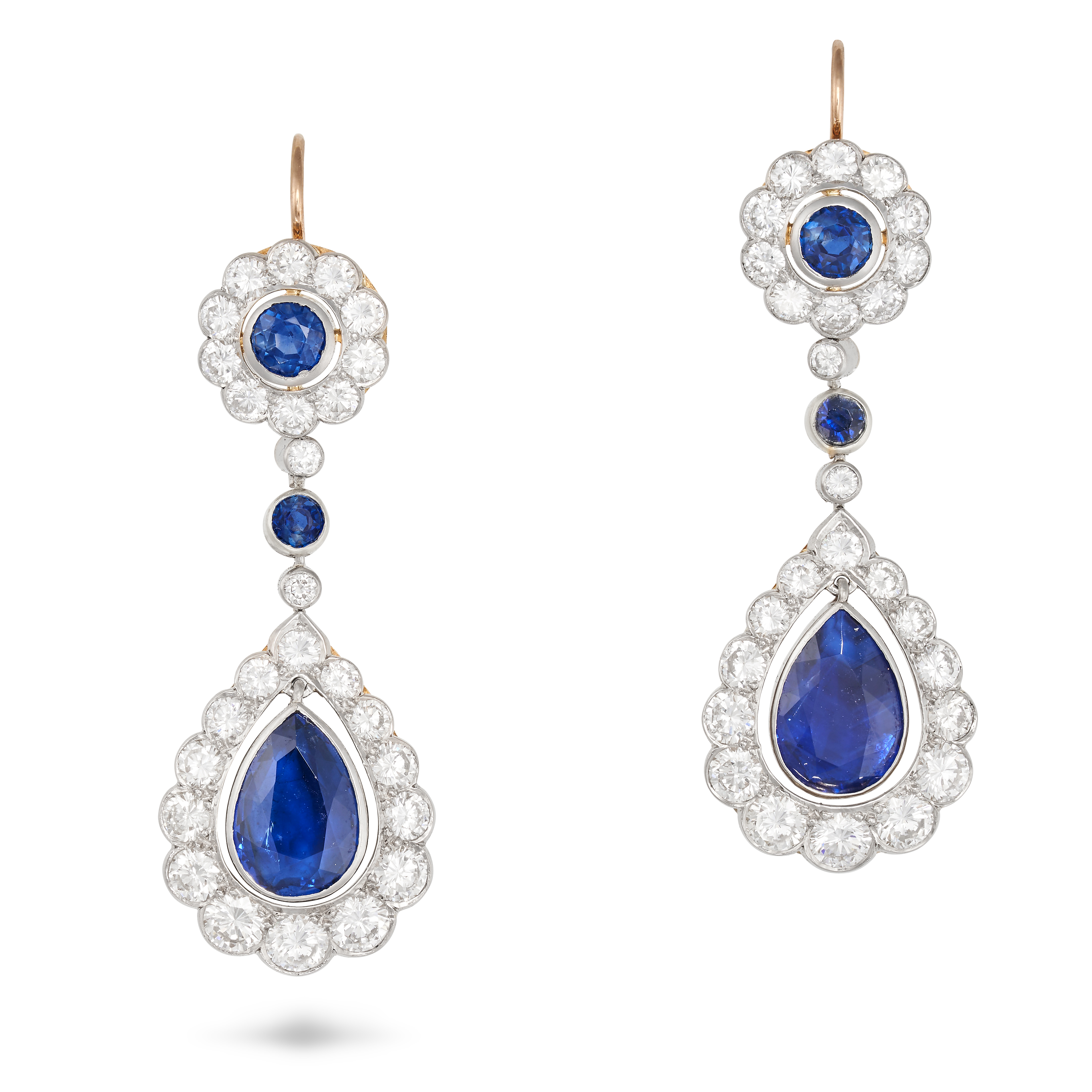 A FINE PAIR OF SAPPHIRE AND DIAMOND DROP EARRINGS each set with a round cut sapphire in a cluster...