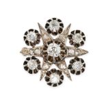 AN ANTIQUE DIAMOND STAR BROOCH in yellow gold and silver, designed as a six rayed star set throug...