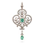 AN ANTIQUE GREEN TOURMALINE AND DIAMOND PENDANT in yellow gold and silver, the openwork foliate s...