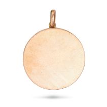 A GOLD LOCKET PENDANT in yellow gold, the circular pendant opening to reveal two glass covered lo...