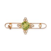 AN ANTIQUE PERIDOT AND DIAMOND BROOCH in 15ct yellow gold, set with a round cut peridot accented ...