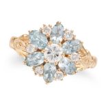 AN AQUAMARINE AND DIAMOND CLUSTER RING in 14ct yellow gold, set with a round brilliant cut diamon...
