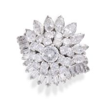 A DIAMOND DRESS RING set with a round brilliant cut diamond in a double cluster of round brillian...