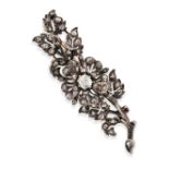 AN ANTIQUE DIAMOND FLOWER BROOCH in 18ct yellow gold and silver, designed as a floral spray set t...