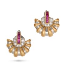 A PAIR OF RUBY AND DIAMOND CLIP EARRINGS in yellow and white gold, set with a row of square step ...