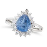 A SAPPHIRE AND DIAMOND CLUTER RING set with a pear cut sapphire of approximately 2.70 carats in a...
