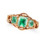 AN EMERALD THREE STONE RING in 18ct yellow gold, set with three octagonal step cut emeralds all t...