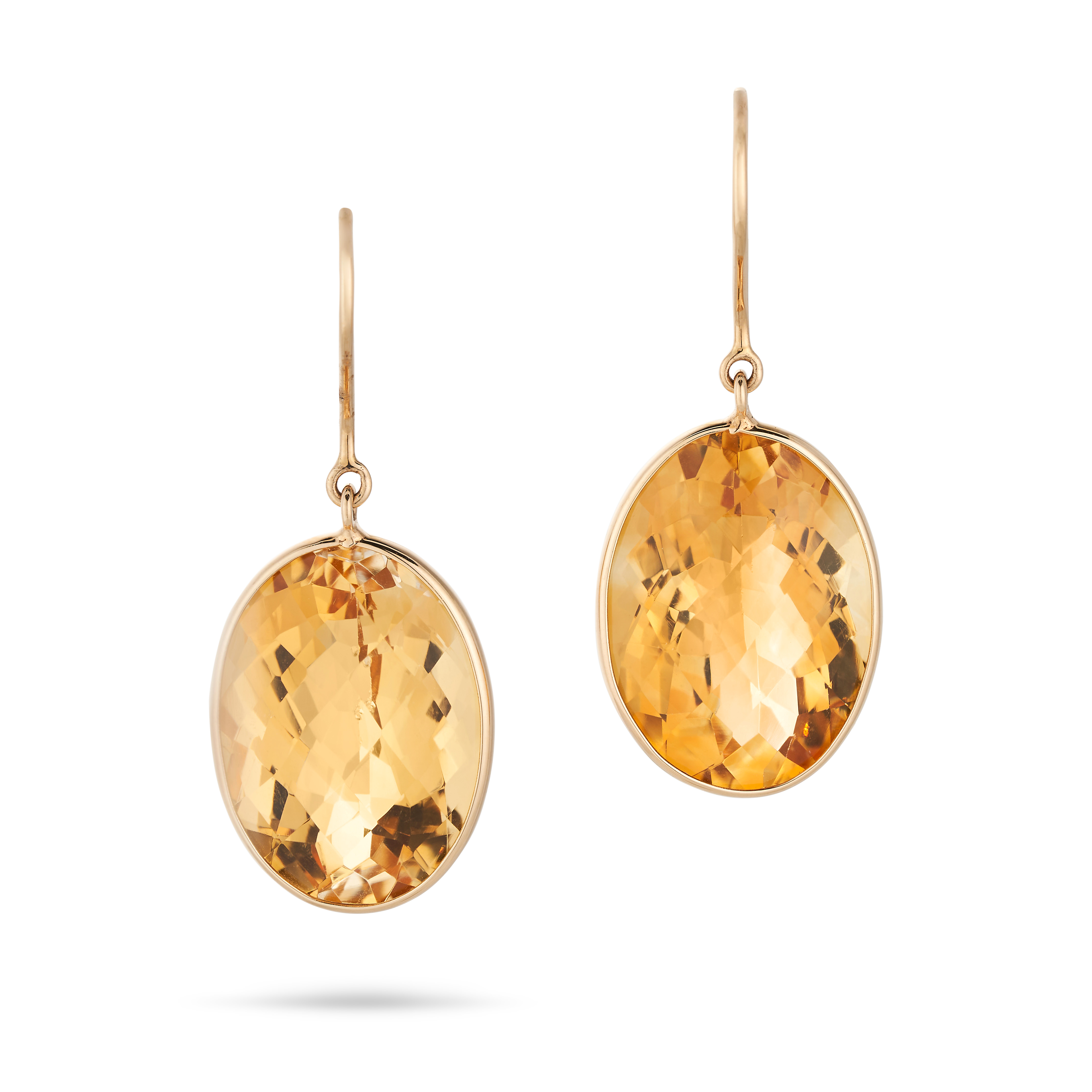 A PAIR OF CITRINE DROP EARRINGS each set with an oval citrine, stamped 14K, 3.2cm, 5.7g.