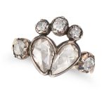 AN ANTIQUE DIAMOND SWEETHEART RING in yellow gold and silver, designed as a heart surmounted by a...