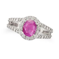 A RUBY AND DIAMOND RING set with an oval cut ruby of approximately 1.13 carats in a cluster of ro...