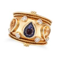 AN IOLITE, CITRINE AND DIAMOND DRESS RING in 18ct yellow gold, set with a pear cut iolite and two...