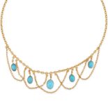AN ANTIQUE TURQUOISE SWAG NECKLACE comprising a trace chain suspending five oval cabochon turquoi...