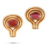 A PAIR OF GARNET CLIP EARRINGS in 18ct yellow gold, each set with an oval cabochon garnet, stampe...