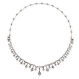 AN ANTIQUE DIAMOND FRINGE NECKLACE in yellow gold and silver, set with a row of old cut diamonds,...