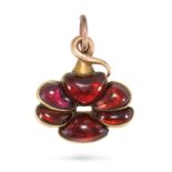 AN ANTIQUE GARNET PENDANT in yellow gold, set with cabochon garnets, no assay marks, 2.7cm, 5.0g.