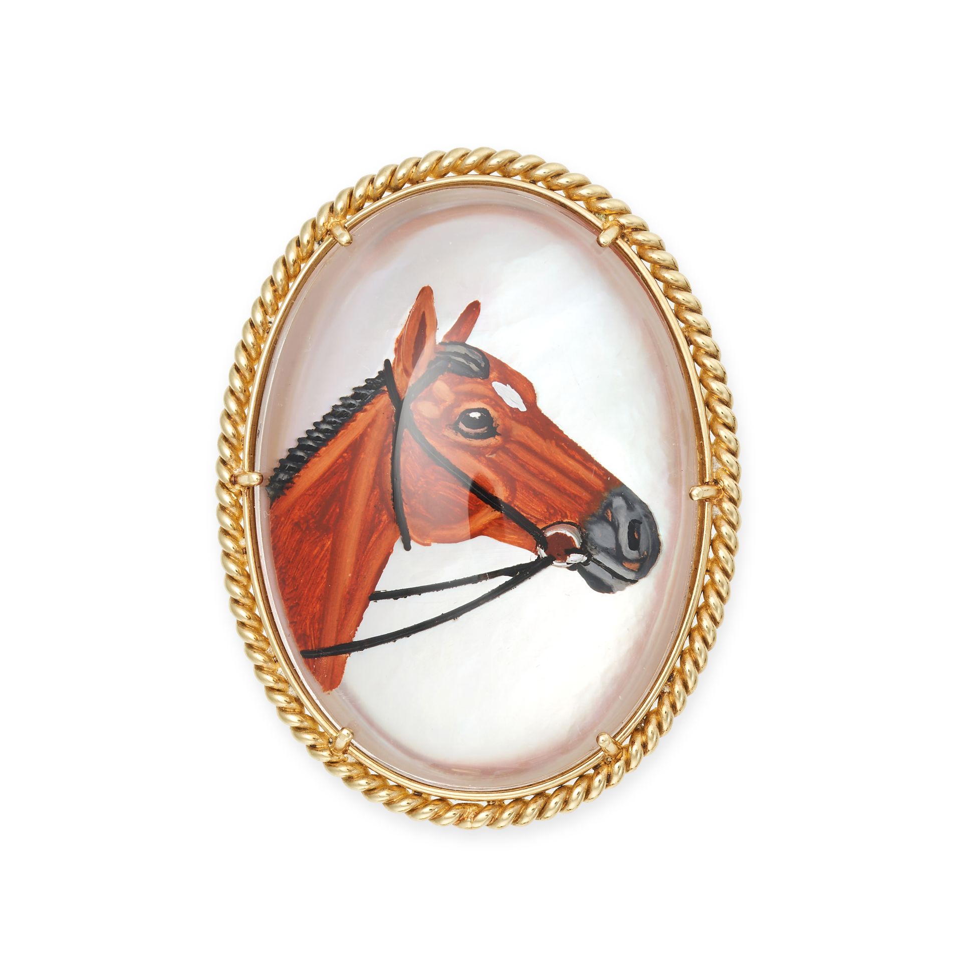 AN ESSEX CRYSTAL REVERSE INTAGLIO HORSE BROOCH in 14ct yellow gold, set with an oval reverse carv...