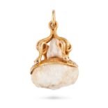 AN ANTIQUE NATURAL FRESHWATER PEARL AND RUBY SNAKE PENDANT in yellow gold, designed as four coile...