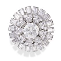 A VINTAGE DIAMOND COCKTAIL RING in platinum, the domed ring set with a round brilliant cut diamon...