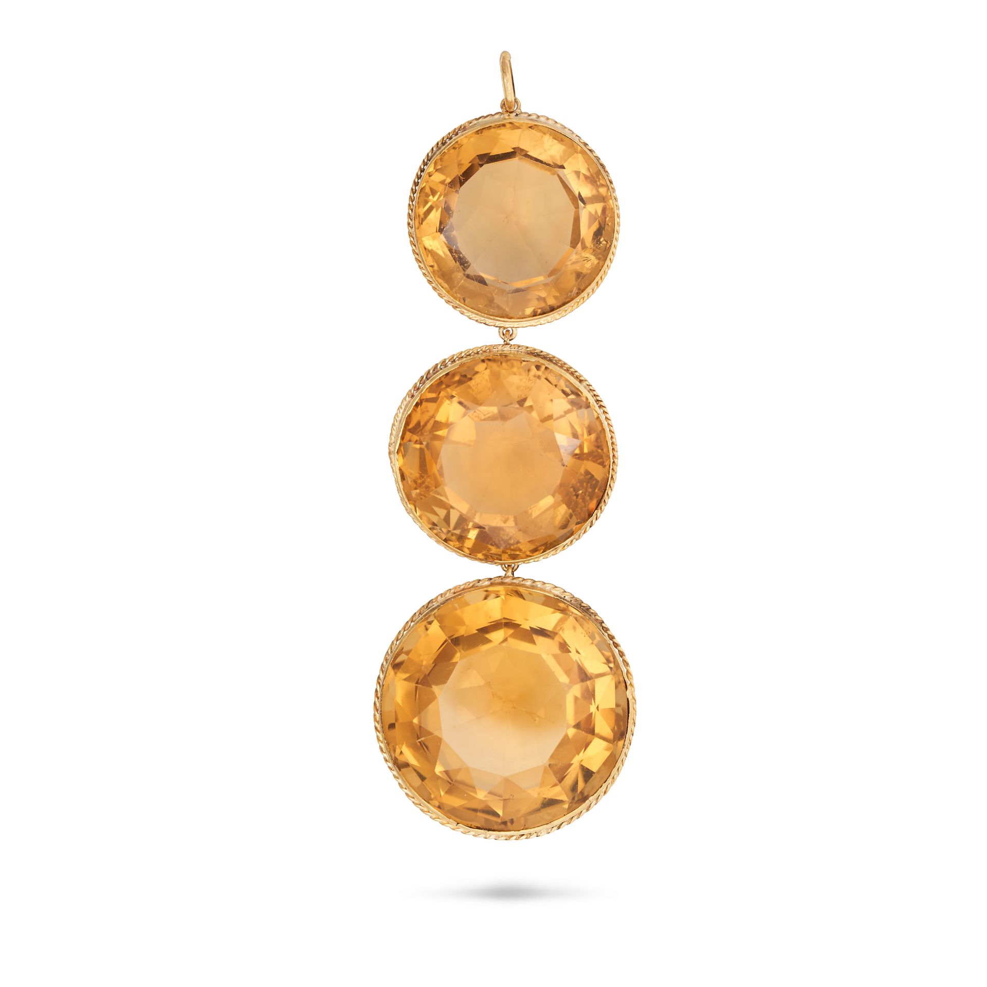 AN ANTIQUE CITRINE PENDANT in yellow gold, comprising three graduating round cut citrines, no ass...