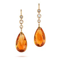 A PAIR OF CITRINE AND DIAMOND DROP EARRINGS each comprising a row of round brilliant cut diamonds...