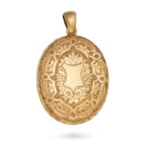 AN ANTIQUE GOLD LOCKET PENDANT in yellow gold, the oval hinged locket engraved in foliate design,...