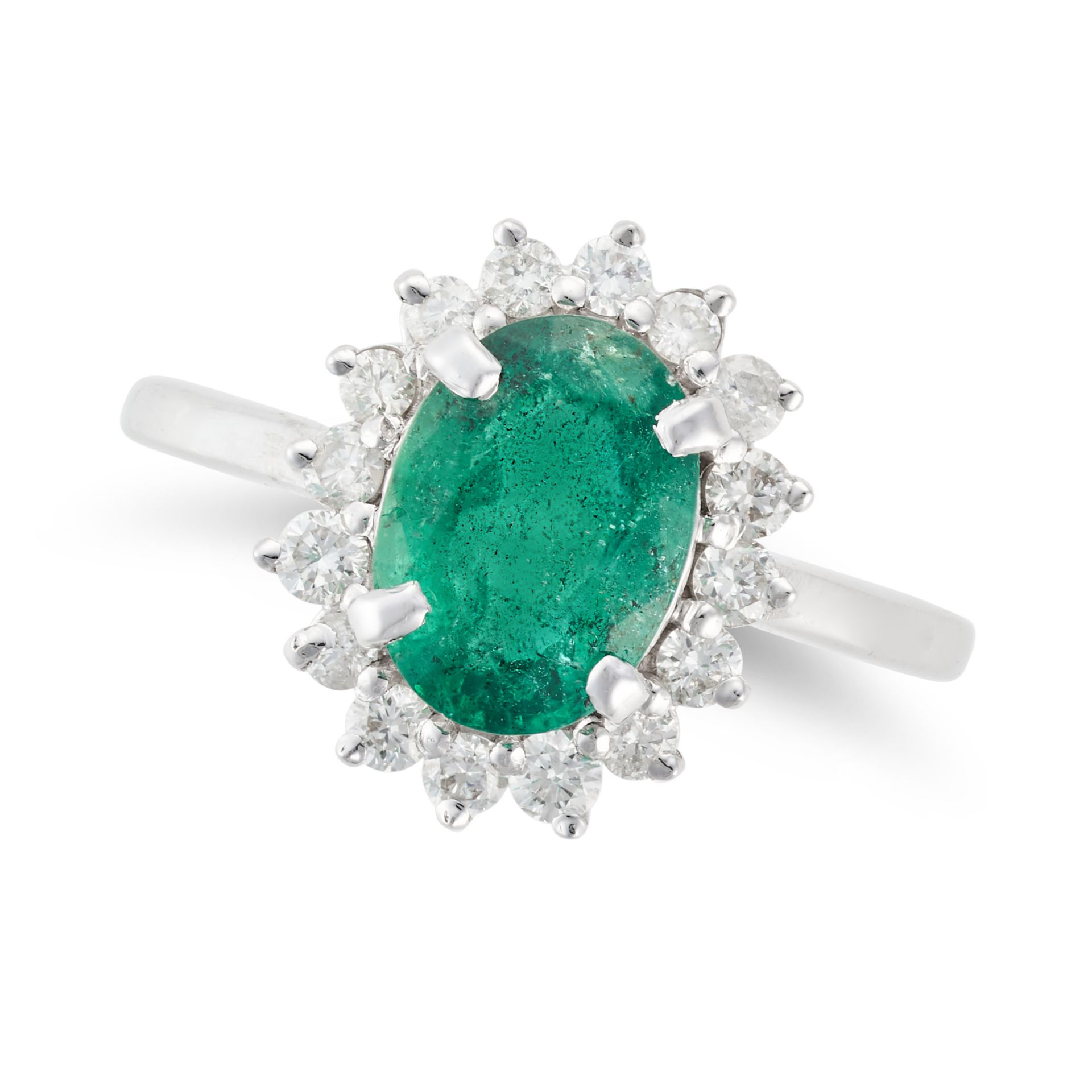 AN EMERALD AND DIAMOND CLUSTER RING set with an oval cut emerald of approximately 1.99 carats in ...