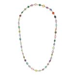 AN ANTIQUE GEMSET HARLEQUIN NECKLACE in 9ct yellow gold, comprising a trace chain set with variou...