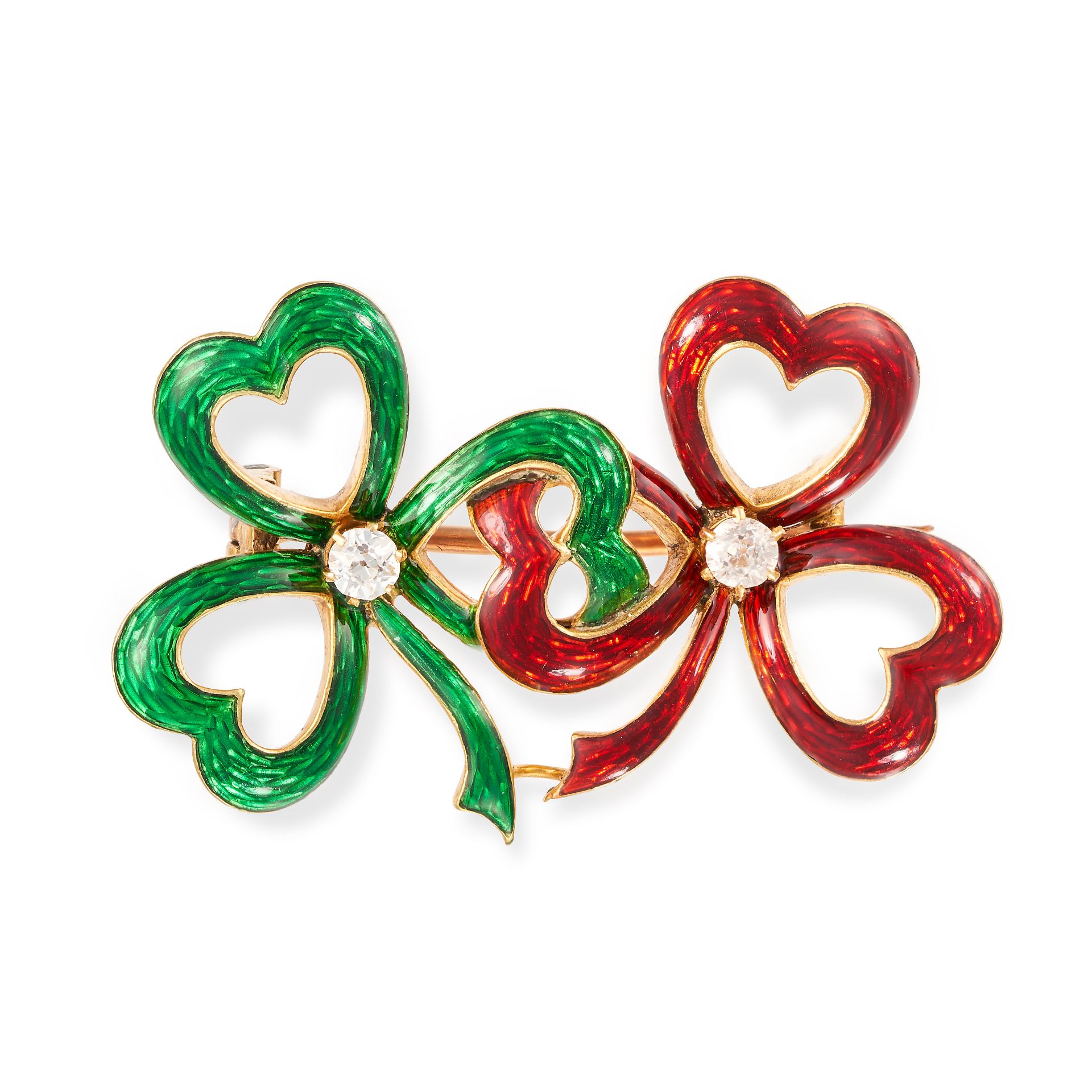 AN ANTIQUE DIAMOND AND ENAMEL SHAMROCK BROOCH in yellow gold, designed as a pair of interlocking ...